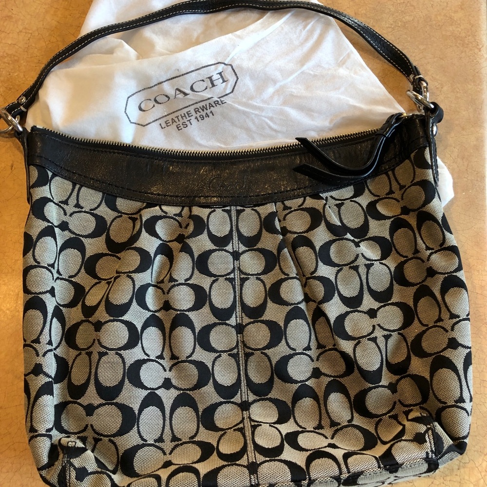 Black leather Coach bag and dust bag